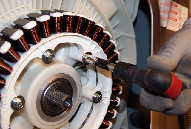 RG-WASH-Replace-Front-Load-Washer-Direct-Drive-Motor-S05a-Remove-the-bolts-in-the-stator.jpg